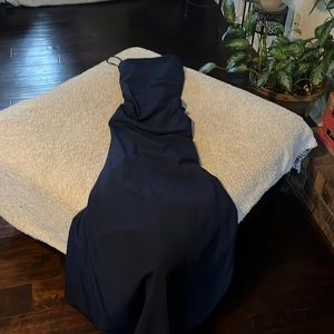 Dark blue dress, spaghetti strap, and straps in the back